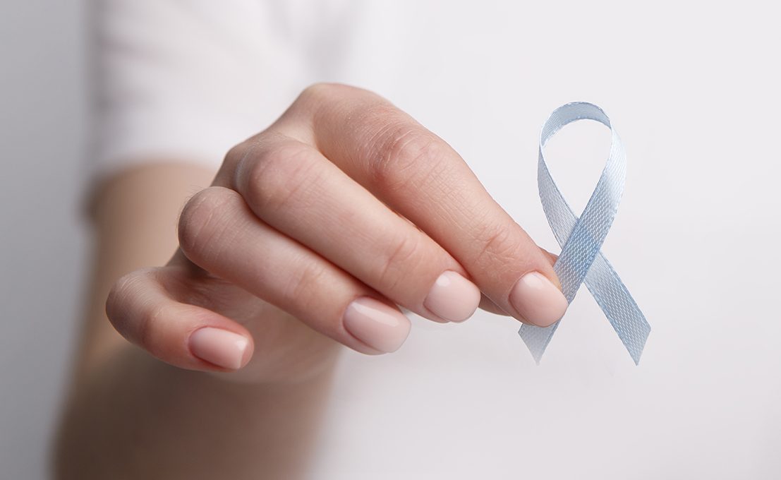Woman holding Blue ribbon, Child Abuse awareness, world diabetes day